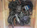 Pallet of used automatic transmission parts, automotive electrical components, and automotive ignition system trainer.