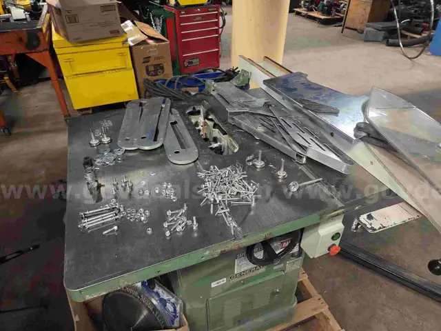 General 10&#x22; cast iron table saw, 3HP 3 phase. C/W table fence extensions, dust collection fixture, spare blades.
