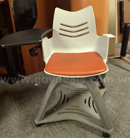 10 Chairs with attached writing board table