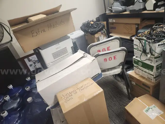 Chairs, Old PCs, Disk Tapes, and Old Phone Accessories