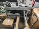 Chairs, Old PCs, Disk Tapes, and Old Phone Accessories