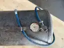 PORTABLE AIR TANK. SIZE UNKOWN. LENSE ON GAUGE BROKEN. STILL WORKS