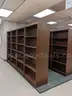 Walnut shelving w/ hardware used in library setting
