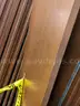 Walnut shelving w/ hardware used in library setting