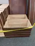 Walnut shelving w/ hardware used in library setting