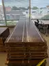 Walnut shelving w/ hardware used in library setting