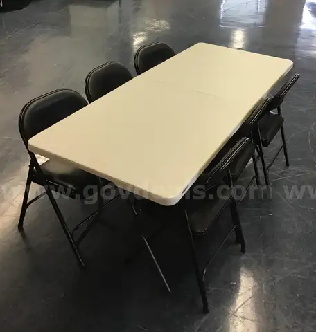 Lot of  (4) Folding Tables and  (24) Folding Chairs