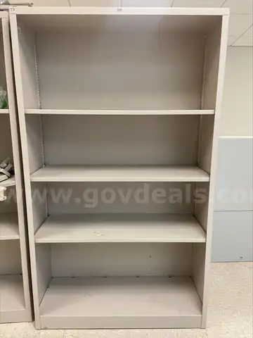Lot of Approx. (12) Metal Bookcases