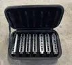 Lot of (7) Bluesband Hohner International Harmonicas in Zipper Case