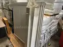 White Plastic Fence Panels with a table umbrella