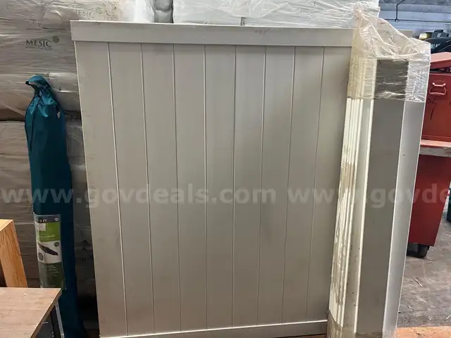 White Plastic Fence Panels with a table umbrella