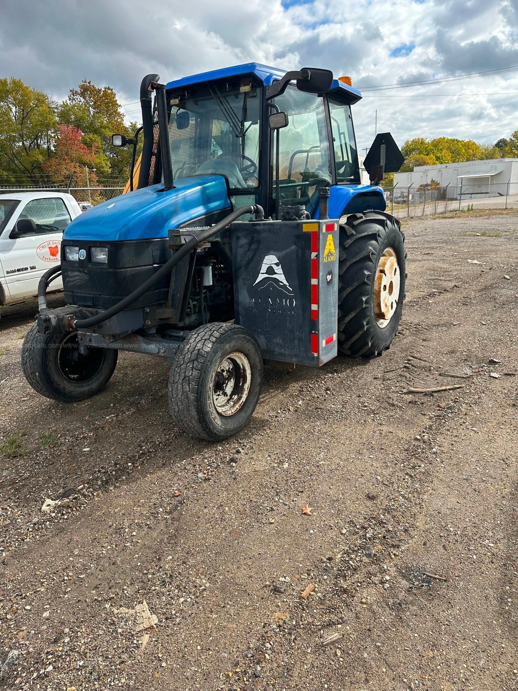 Tractor with discount side arm mower