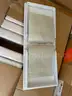 25 Boxes of white DVD cases