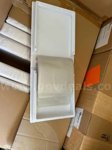 25 Boxes of white DVD cases