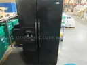 #3947 Used Whirlpool Refrigerator