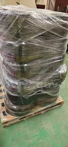 Pallet of old golf cart tires and rims, filters