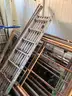 scaffolding, 8 side pannels, 7 support poles ( X poles), 3 walk boards.