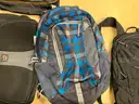 Lot of backpacks and large bags
