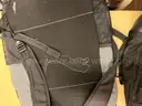 Lot of backpacks and large bags