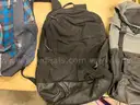 Lot of backpacks and large bags