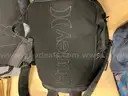 Lot of backpacks and large bags