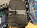 Lot of backpacks and large bags