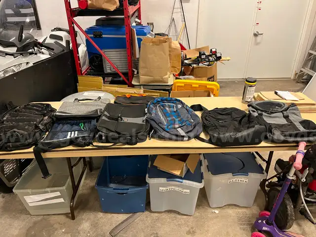 Lot of backpacks and large bags