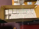 A Lot of Ink Cartridges and Toners