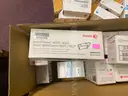 A Lot of Ink Cartridges and Toners