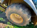 2002 John Deere 310SB w/ Extend Boom