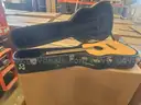 31 Guitar Hard Cases &#x2013; 14 w/ Acoustic Guitars, 17 Empty