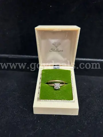 ONE LADIES RING SET IN BOX, GOLD IN COLOR: THIN SOLID BAND, BENT; AND EGAGEMENT TYPE RING WITH SQUARE SET CONTAINING ONE