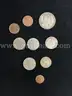 NINE FOREIGN COINS