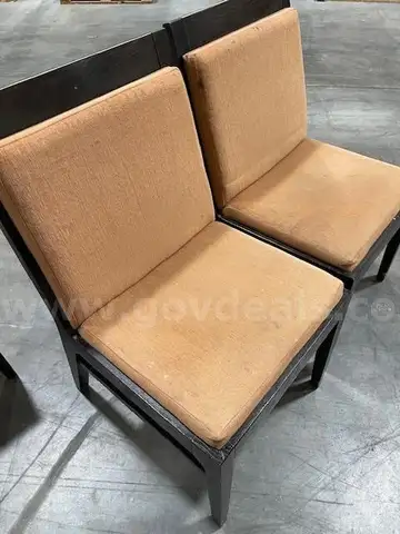 Restaurant chairs, padded, dark wood frame, tan cushions, 76 each