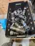large box of nozzles, bales, and depth limiters