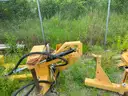 Diamond boom mower