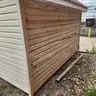 Storage Shed with Rollup Door