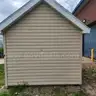 Storage Shed with Rollup Door