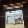 Storage Shed with Rollup Door