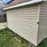 Storage Shed with Rollup Door