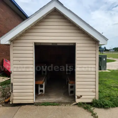 Storage Shed with Rollup Door