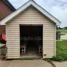 Storage Shed with Rollup Door