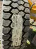 Brand new 245/70R19.5 Tire on rim from GMC
