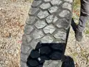 Brand new 245/70R19.5 Tire on rim from GMC