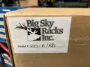 ASSORTED POLICE VEHICLE LOCKING GUN RACKS