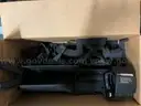 ASSORTED POLICE VEHICLE LOCKING GUN RACKS