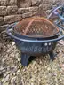 Fire pit with removable grill