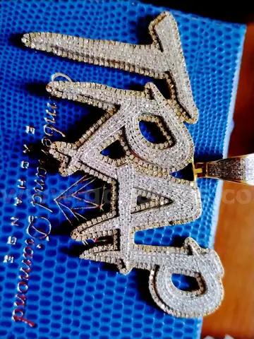 10KT GOLD 2.5 CARETS 15 GRAMS CHARM