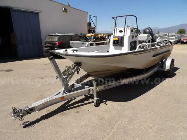 2011 Karavan Trailer with Boston boat