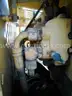 2002 JOHN DEERE 210LE